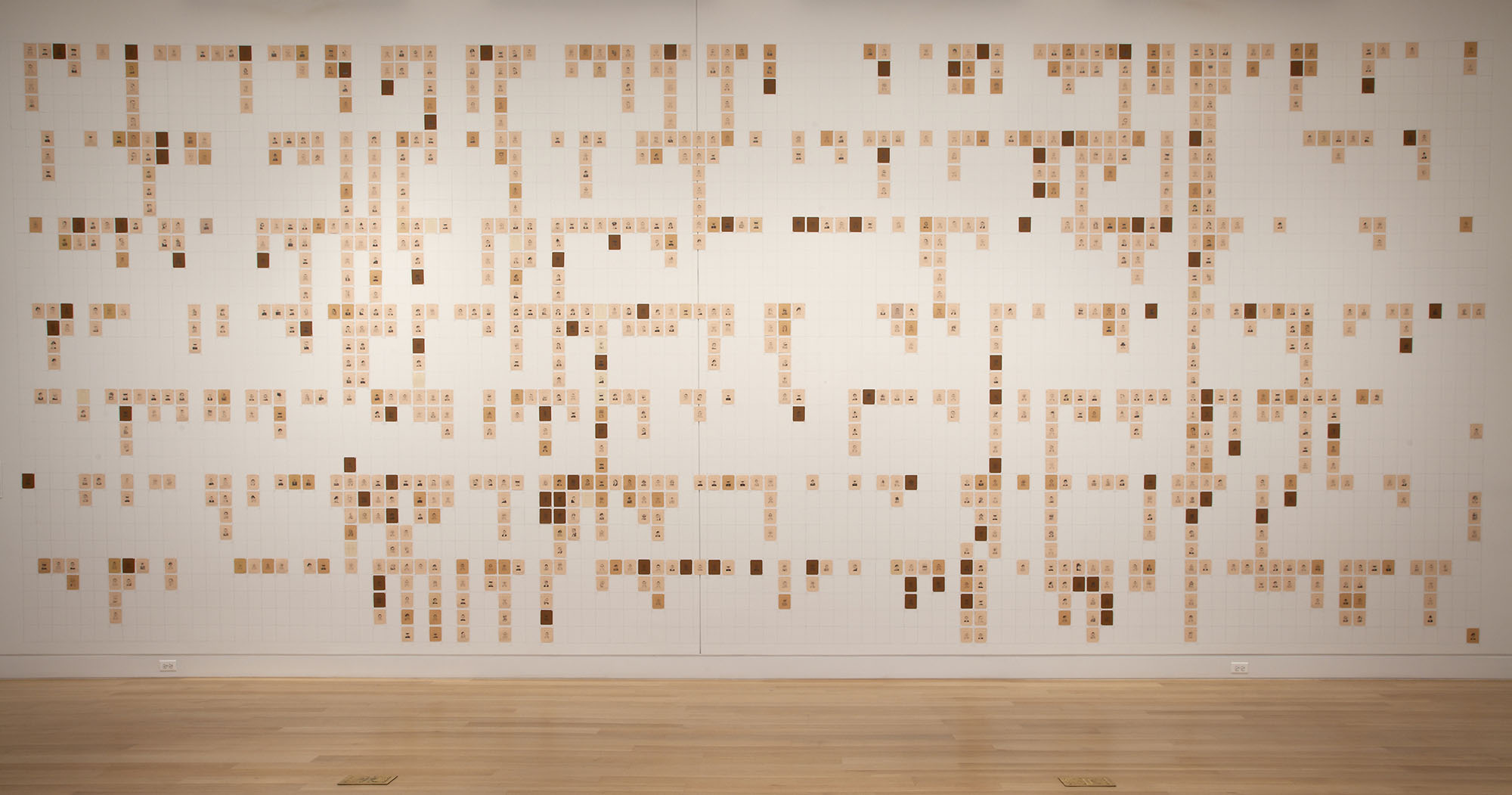 Emily Prince, American servicemen and women who have died in Iraq and Afghanistan (but Not Including the Wounded, nor the Iraqis nor the Afghans), Executed January 2004 – October 2010. 424 Individual Drawings, Hand drawn pencil on color coded vellum. Installation view at DePaul Art Museum, 2012. Courtesy of the artist and Kent Fine Arts